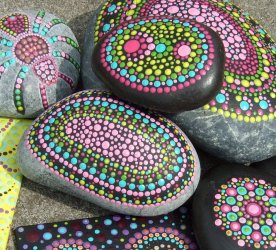 dot painting on rocks